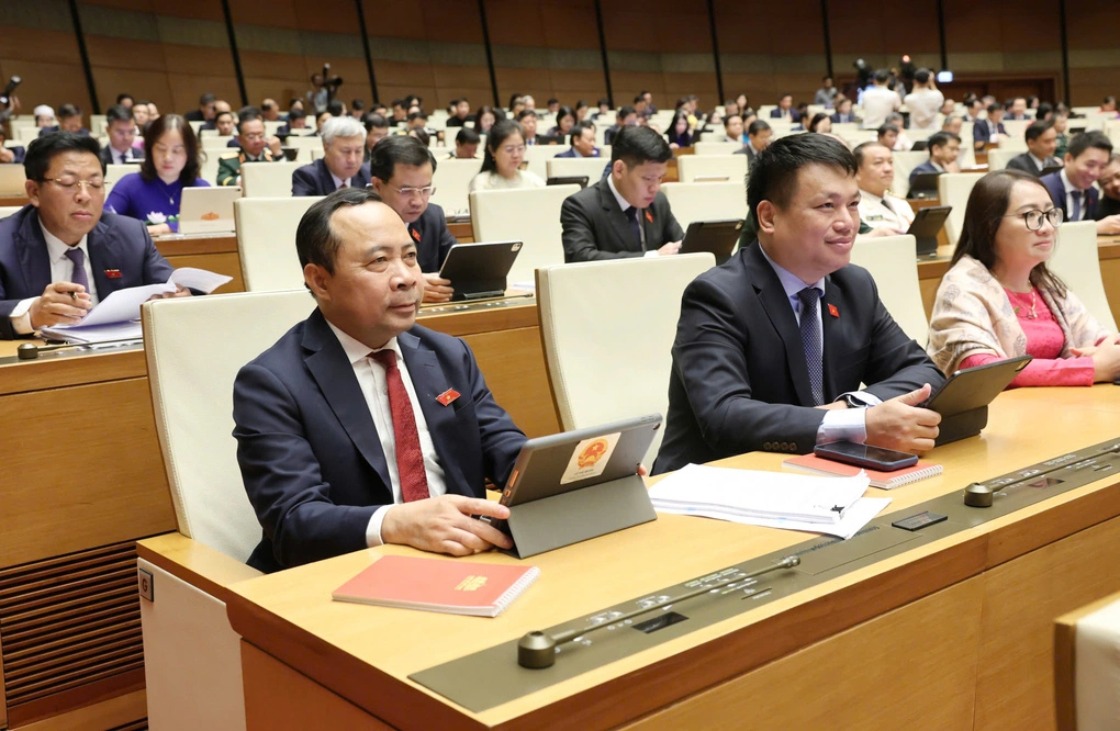 Bộ trưởng Bộ Khoa học và Công nghệ Vũ Hải Quân (đầu tiên, từ trái qua) tại phiên khai mạc kỳ họp Quốc hội, sáng 3/8. Ảnh: Hoàng Phong